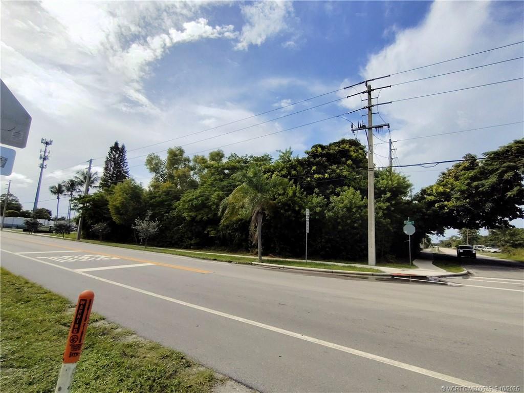 5470 Southeast Ebbtide Avenue Stuart, FL 34997 - Photo 38 of 40 a view of a street with a building in the background
