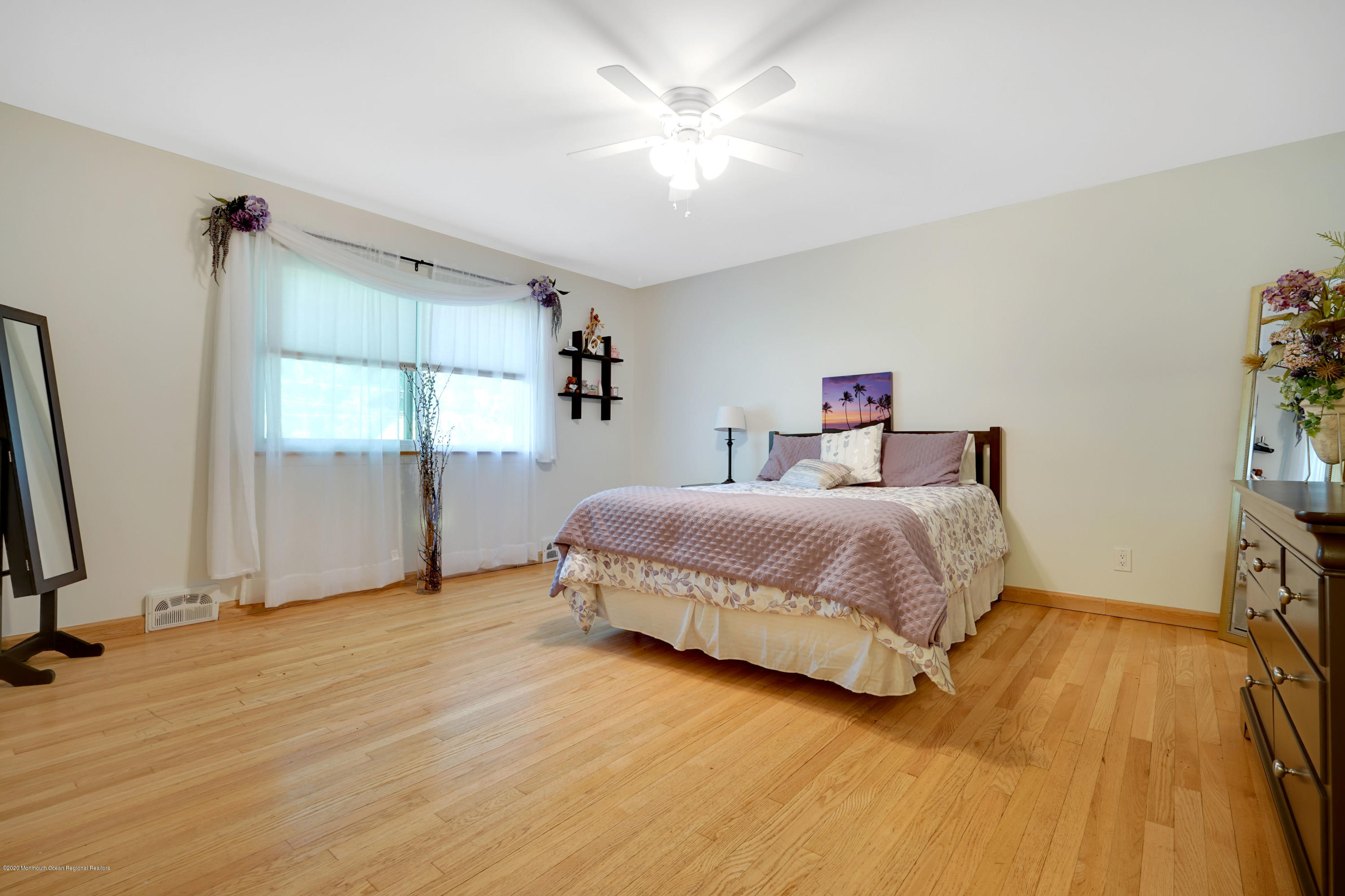 12 Crest Drive Colts Neck, NJ 07722 - Photo 40 of 69 a bedroom with a bed and a flat screen tv