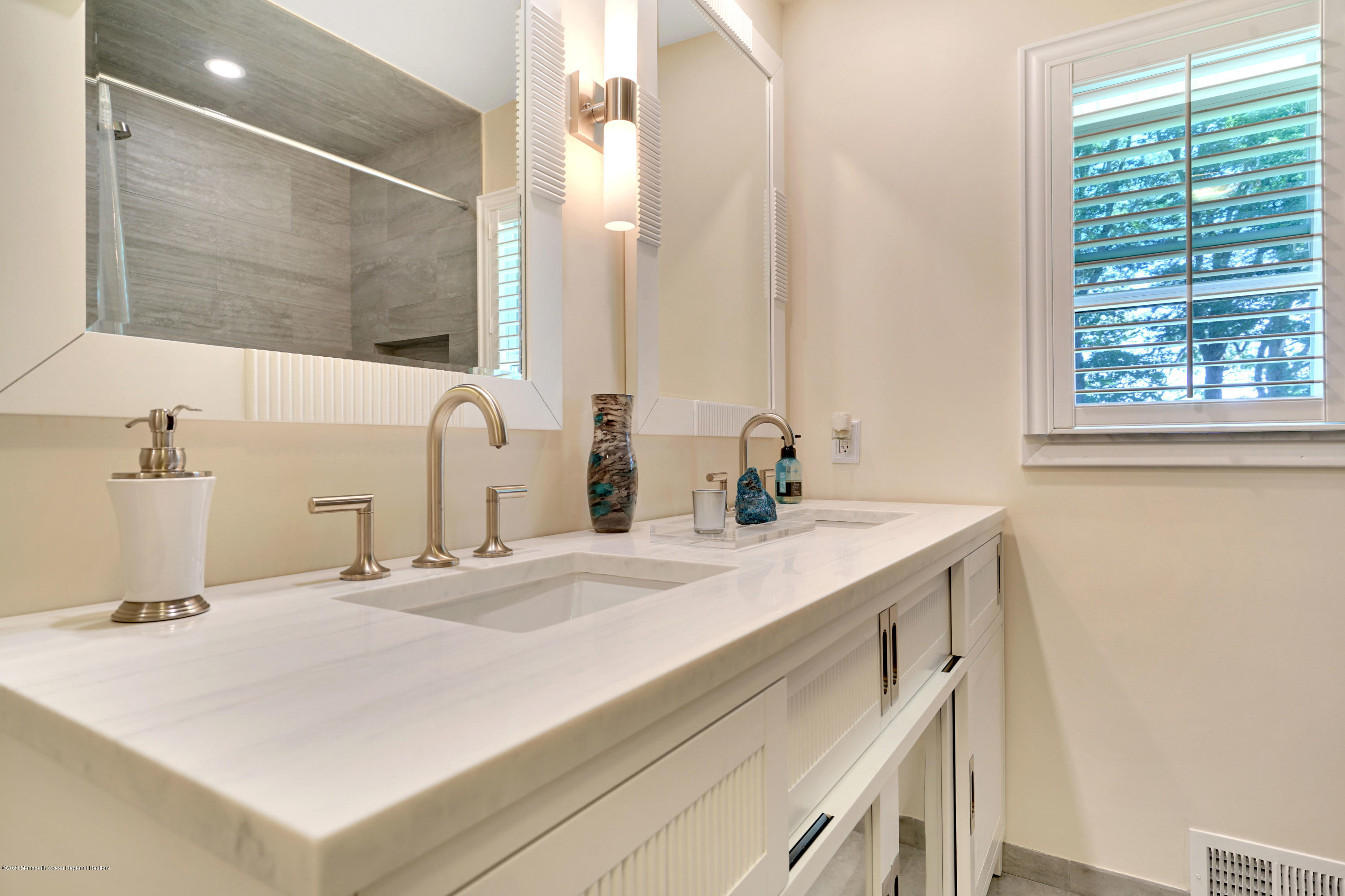 12 Crest Drive Colts Neck, NJ 07722 - Photo 41 of 69 a bathroom with a sink and a mirror