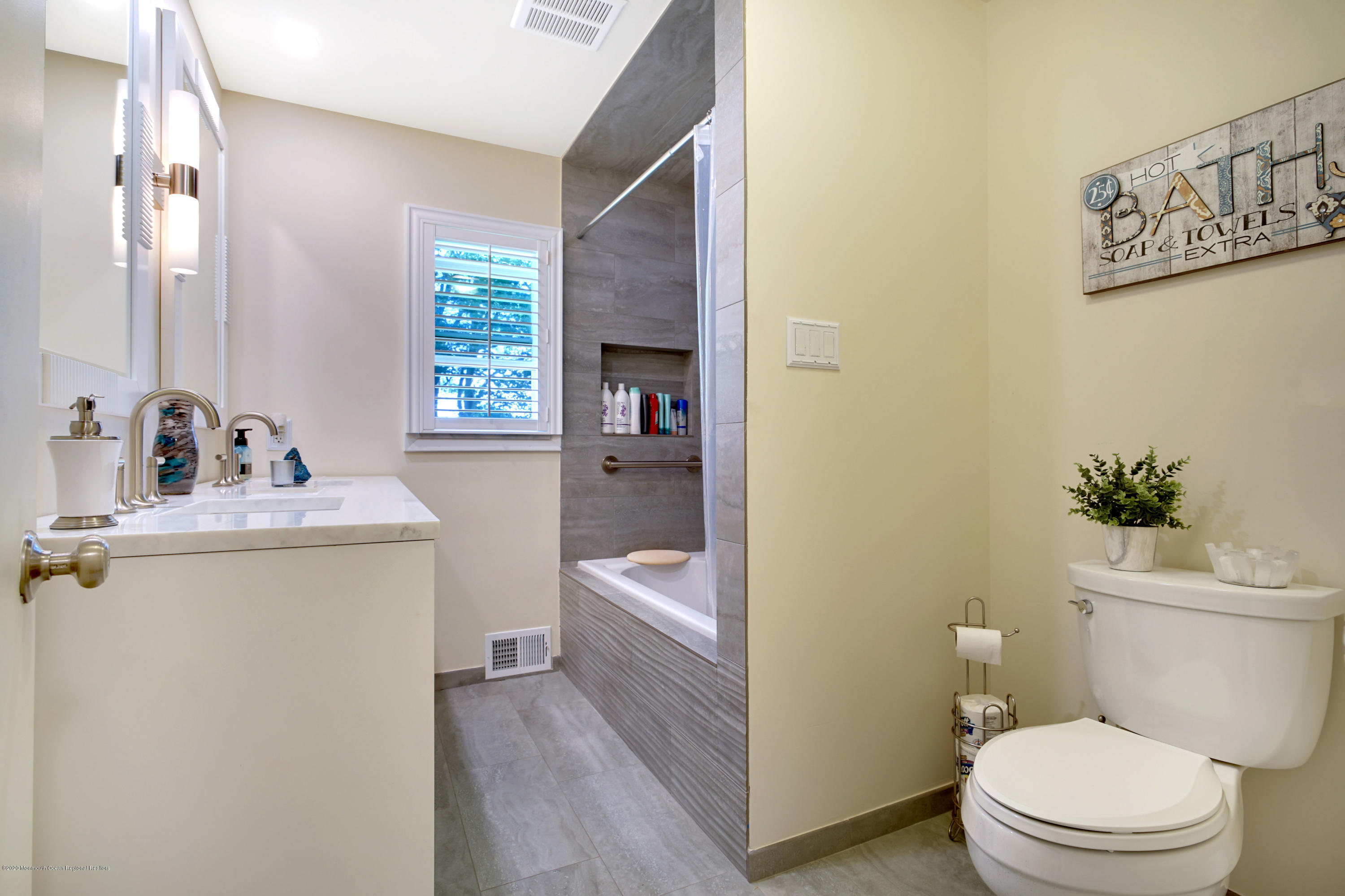 12 Crest Drive Colts Neck, NJ 07722 - Photo 42 of 69 a bathroom with a sink a toilet and tub