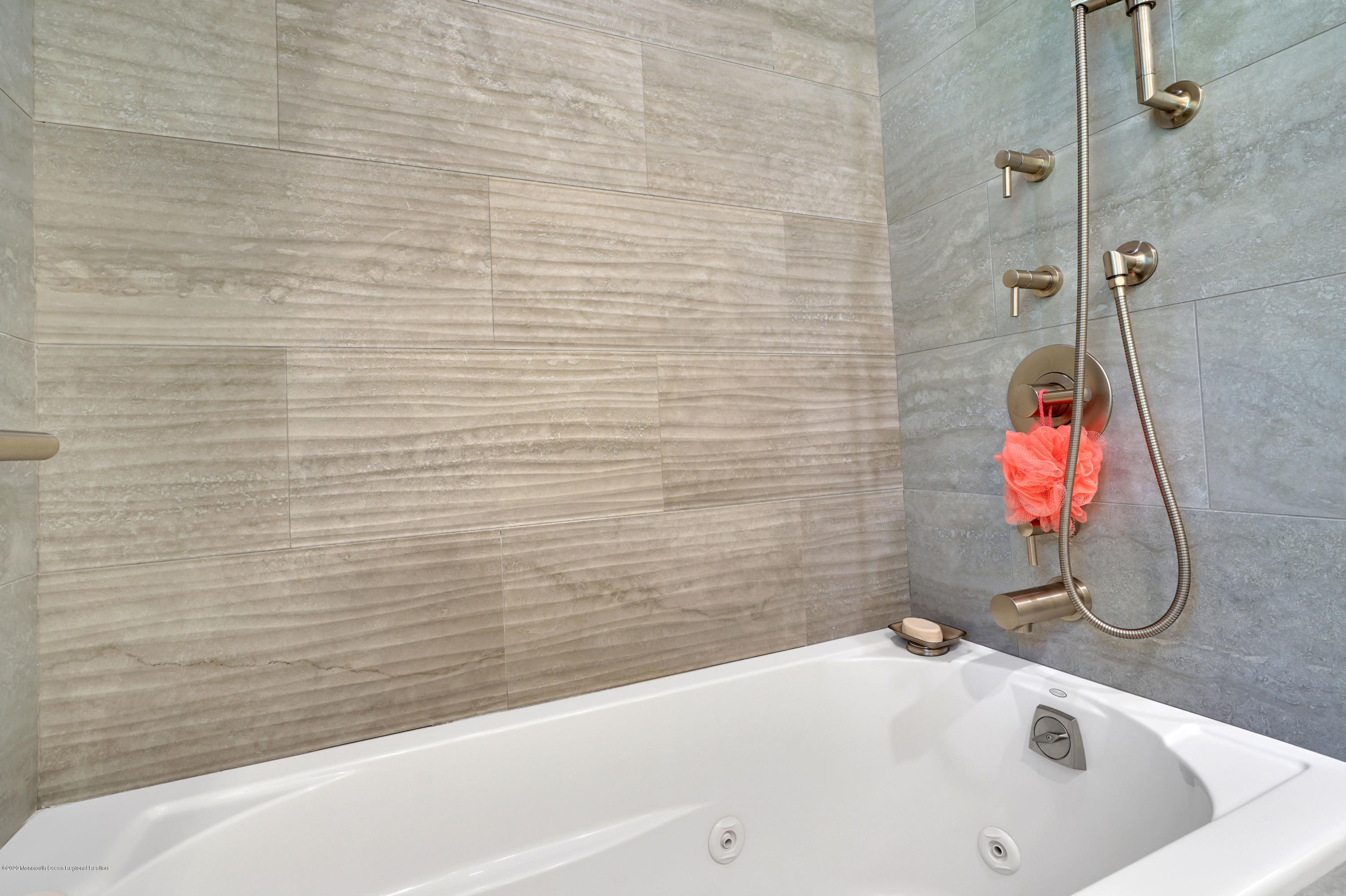 12 Crest Drive Colts Neck, NJ 07722 - Photo 43 of 69 a bathroom with a sink and a bathtub