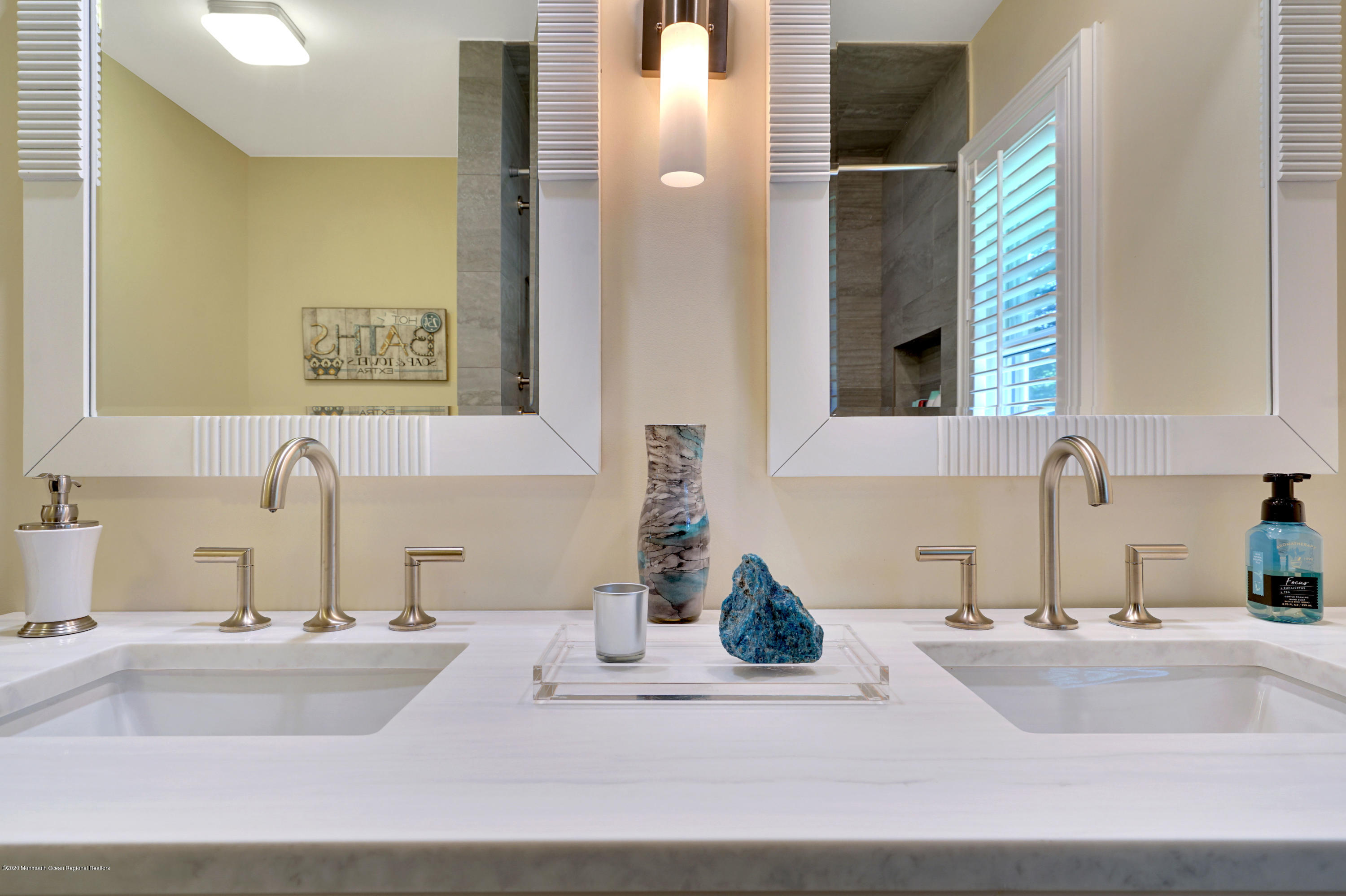 12 Crest Drive Colts Neck, NJ 07722 - Photo 44 of 69 a bathroom with a sink and a mirror