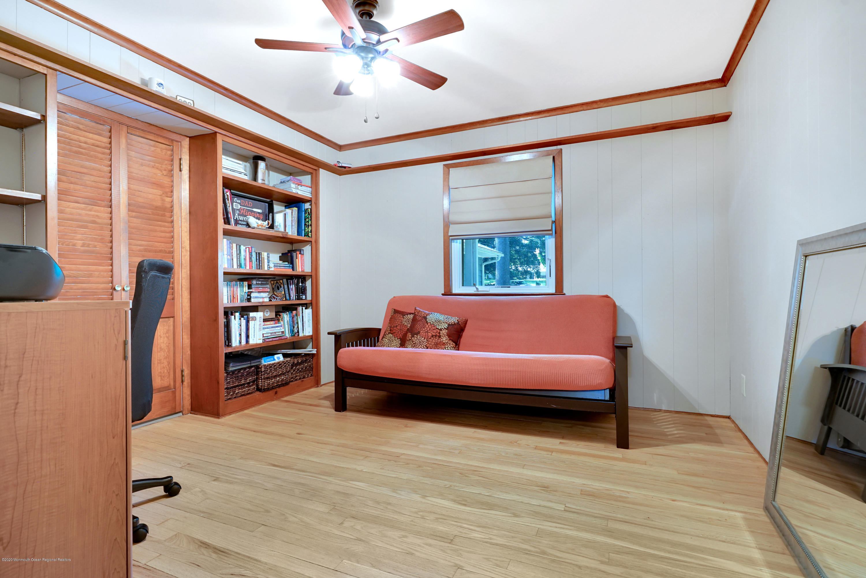 12 Crest Drive Colts Neck, NJ 07722 - Photo 45 of 69 a living room with furniture and a flat screen tv