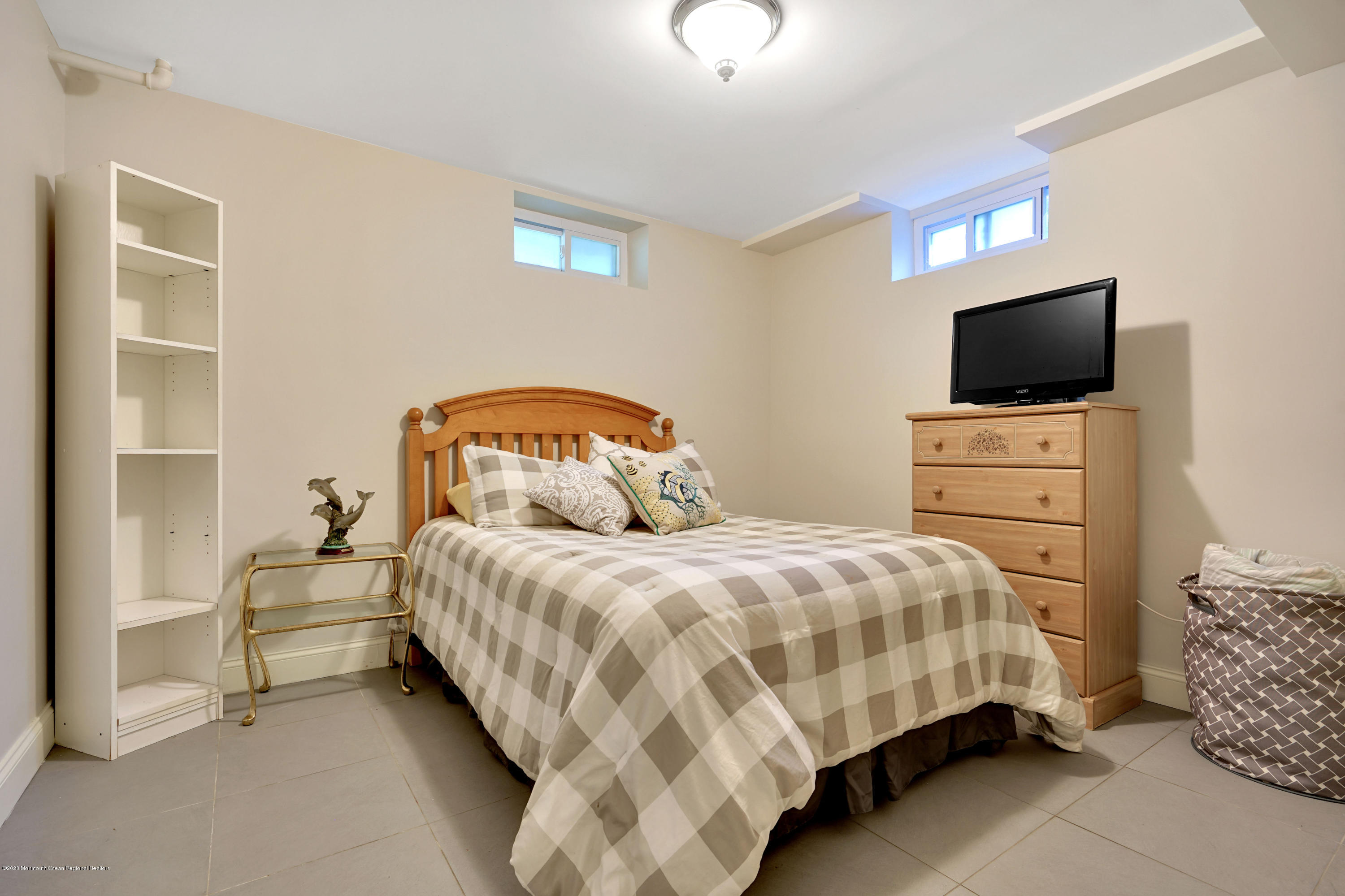 12 Crest Drive Colts Neck, NJ 07722 - Photo 50 of 69 a bedroom with a bed and a television