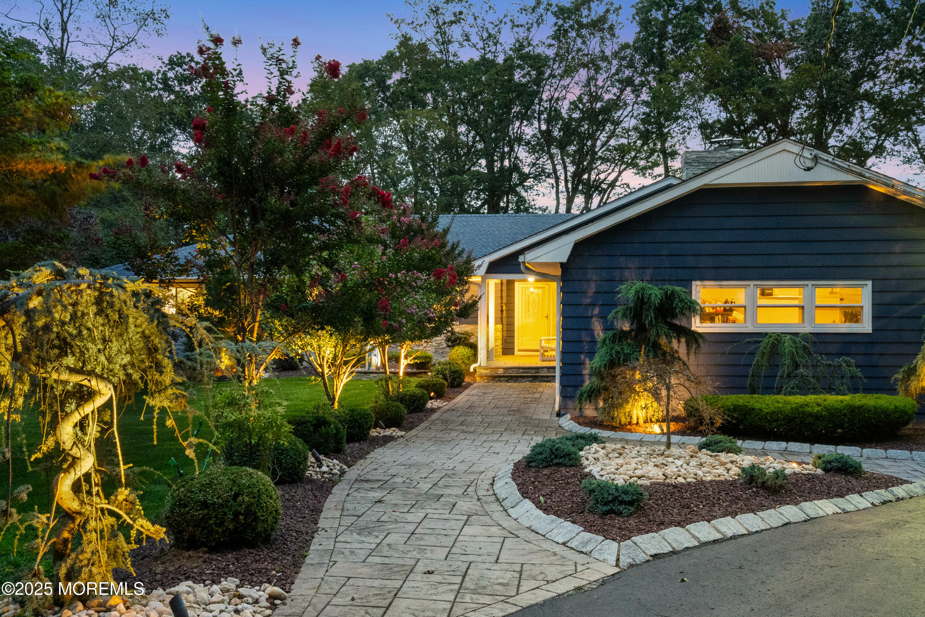 12 Crest Drive Colts Neck, NJ 07722 - Photo 60 of 69 a front view of a house with a yard