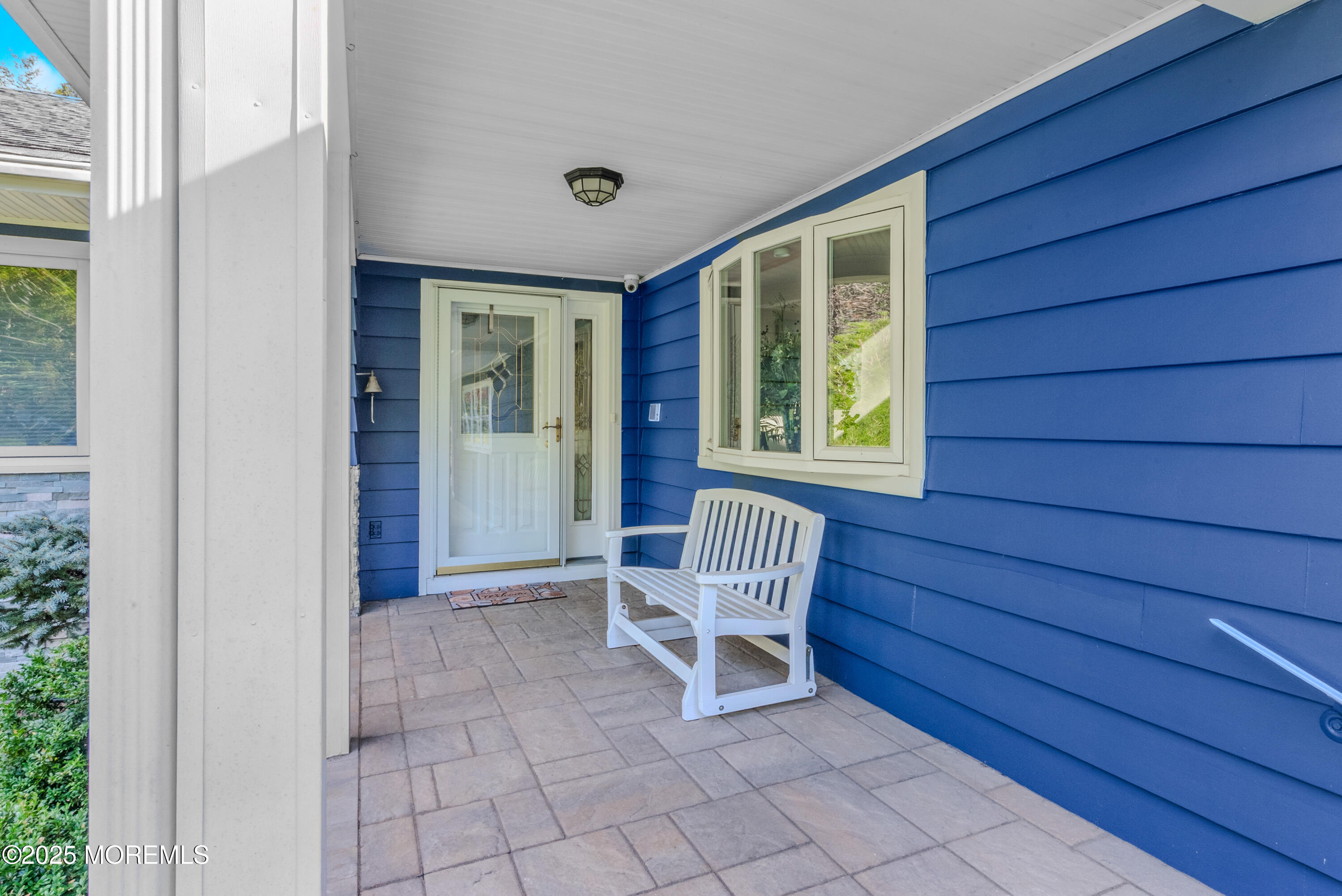 12 Crest Drive Colts Neck, NJ 07722 - Photo 6 of 69 a view of front door with chair and wooden door