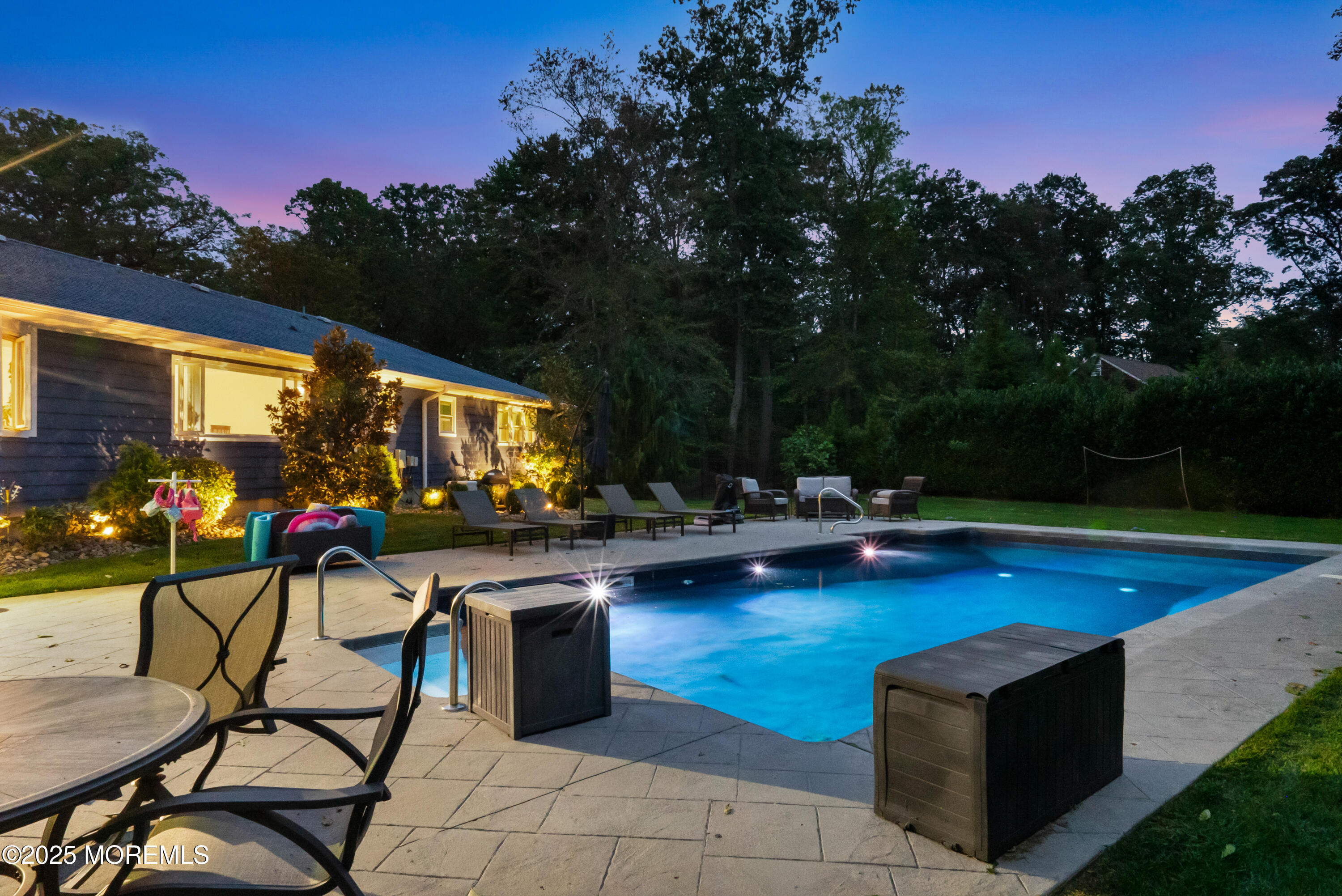 12 Crest Drive Colts Neck, NJ 07722 - Photo 66 of 69 a view of swimming pool with outdoor seating and plants