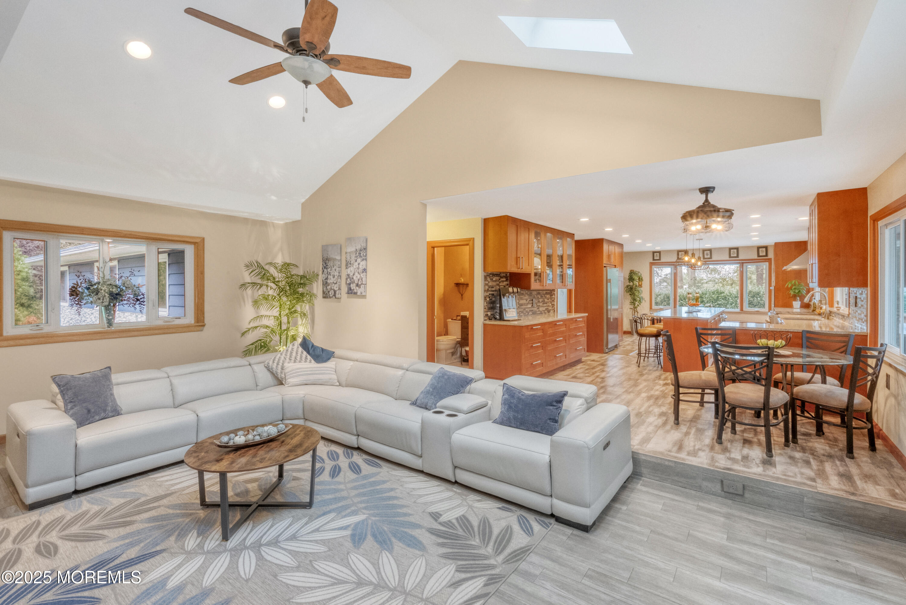 12 Crest Drive Colts Neck, NJ 07722 - Photo 9 of 69 a living room with furniture and a view of kitchen