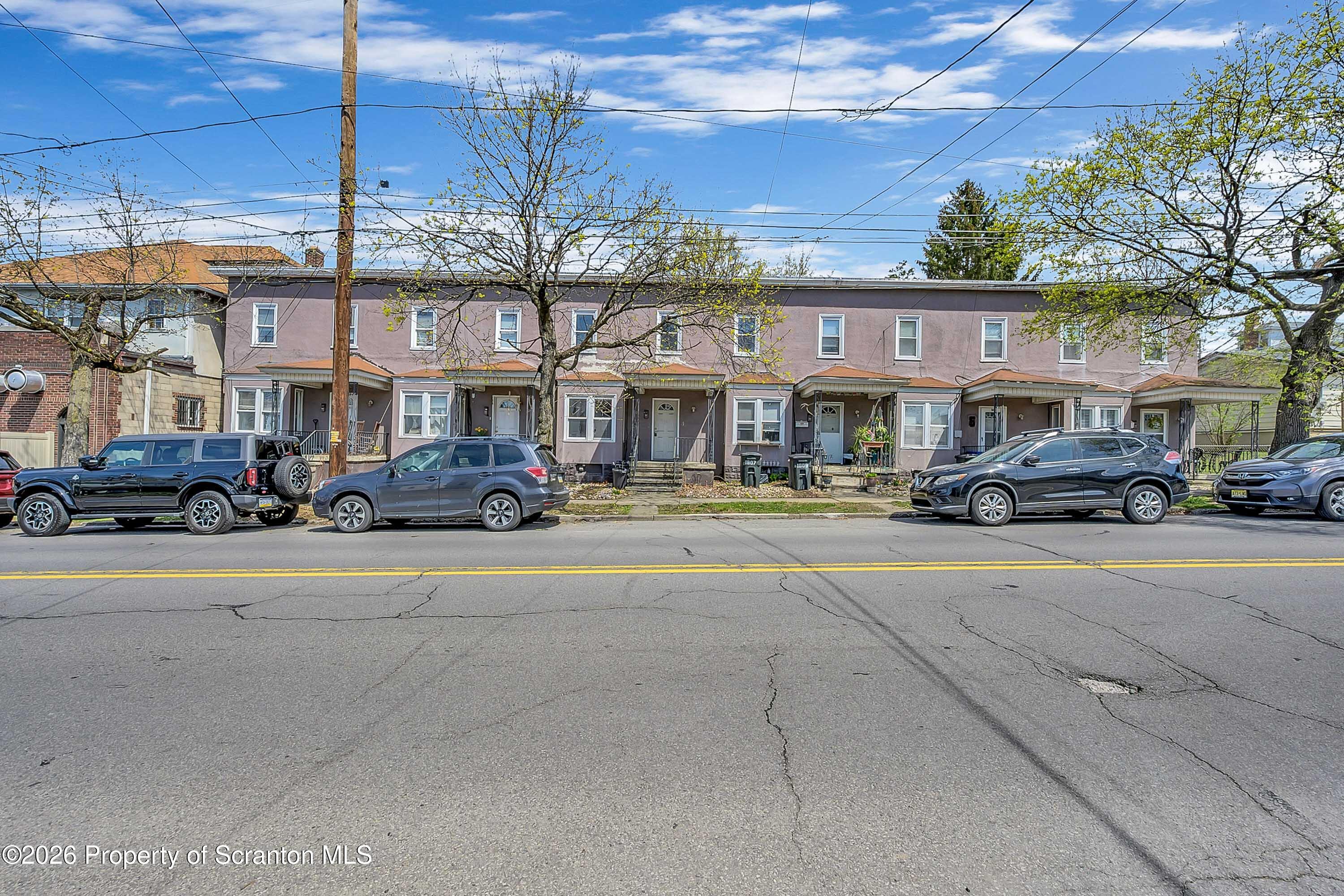 1807 Green Ridge Street Dunmore, PA 18509 - Photo 14 of 14 a building with trees in front of it