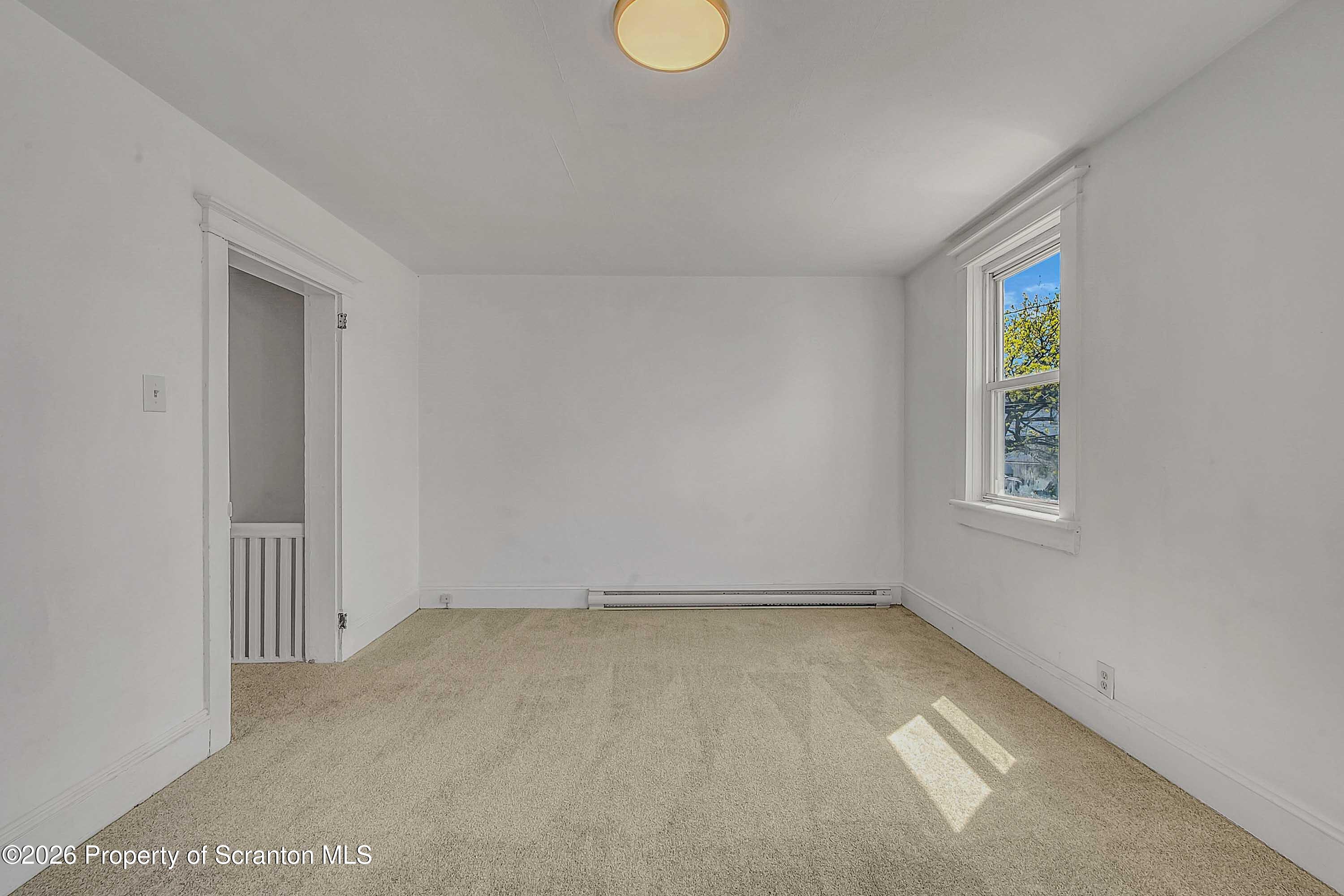 1807 Green Ridge Street Dunmore, PA 18509 - Photo 8 of 14 a view of room with window