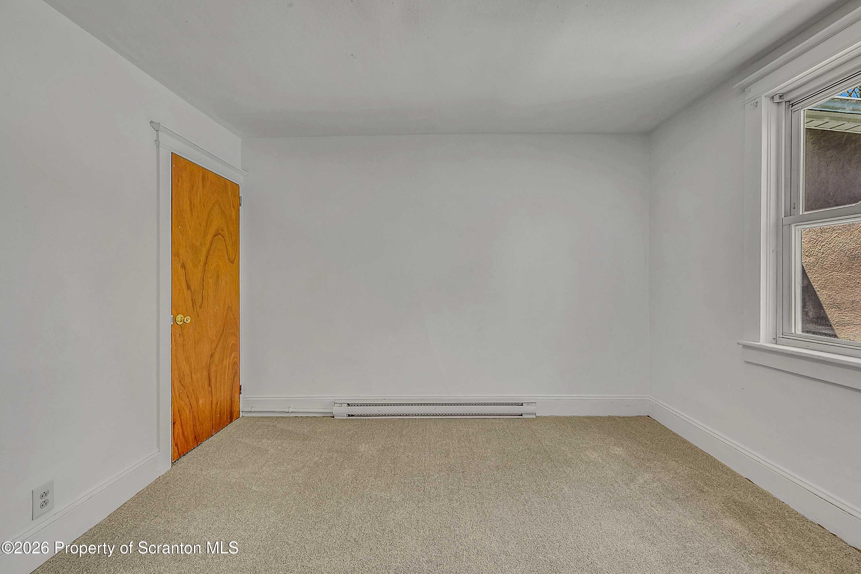 1807 Green Ridge Street Dunmore, PA 18509 - Photo 9 of 14 a view of an empty room