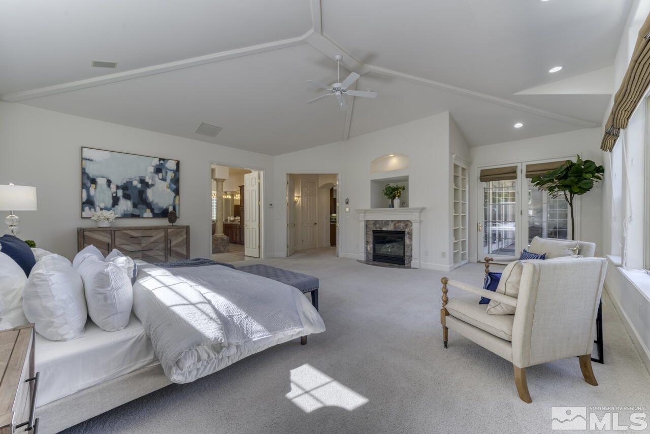 4565 Mountaingate Drive Reno, NV 89519 - Photo 14 of 25 a living room with furniture and a fireplace