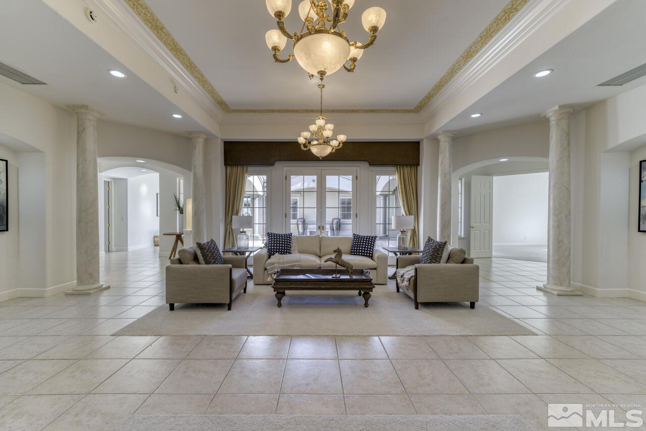 4565 Mountaingate Drive Reno, NV 89519 - Photo 2 of 25 a lobby with furniture and large windows