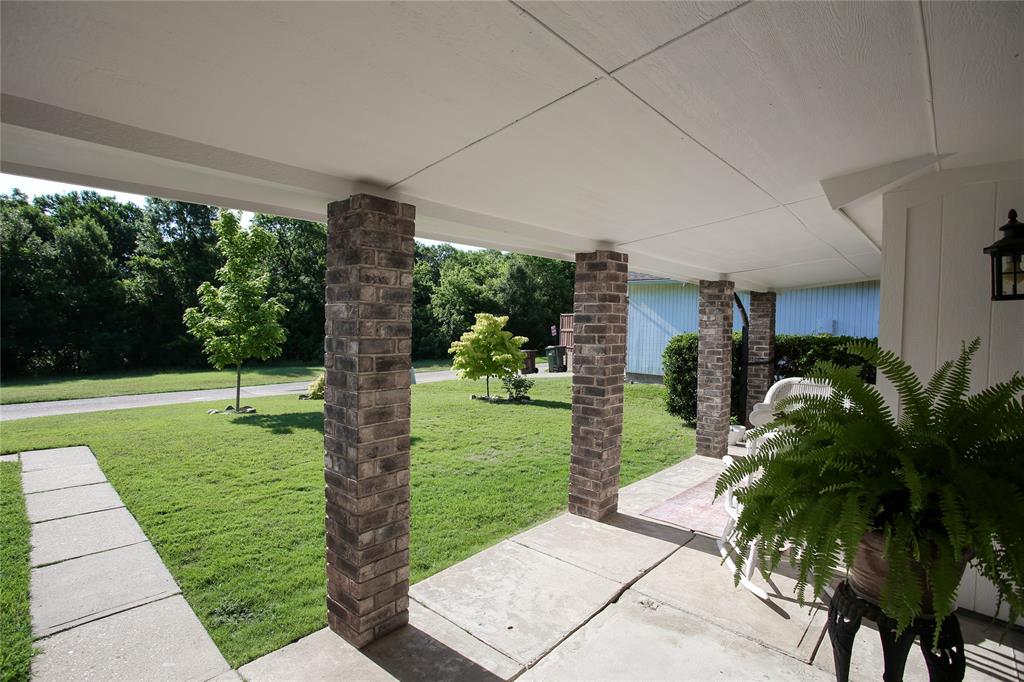 1720 Crystal Way Plano, TX 75074 - Photo 28 of 32 a view of a backyard