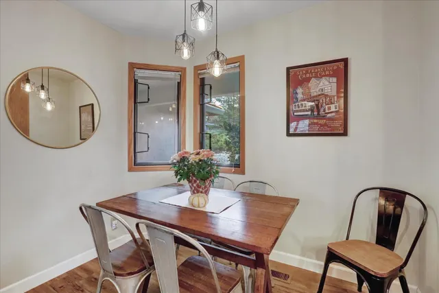 a kitchen with stainless steel appliances granite countertop a stove and a sink