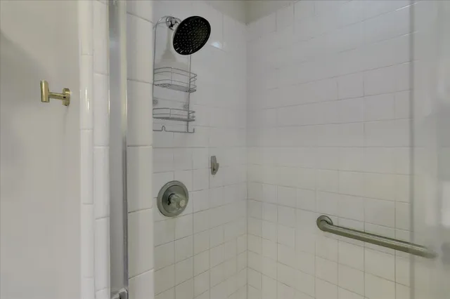 a view of a field with trees in the background