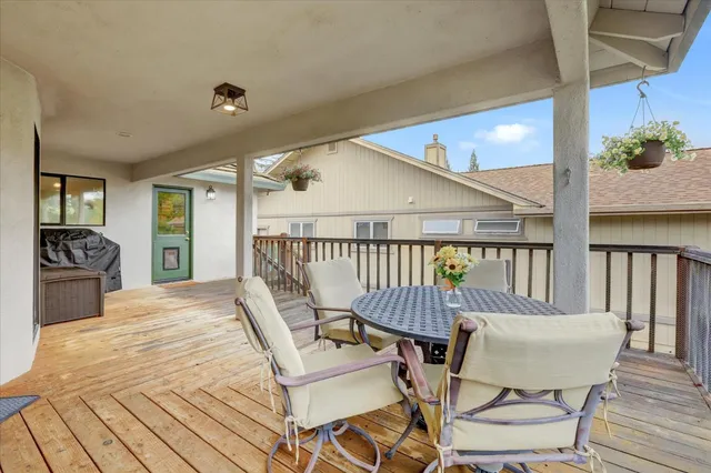 a view of a lake with houses in the back