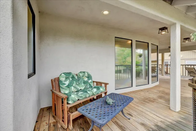 a backyard of a house with lots of green space and trees