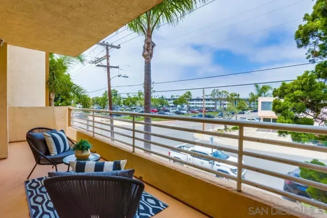 a kitchen with a sink counter top space and stainless steel appliances