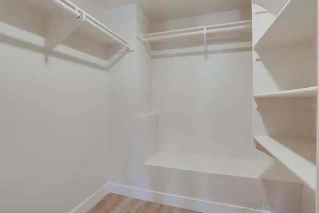 a view of empty room with windows