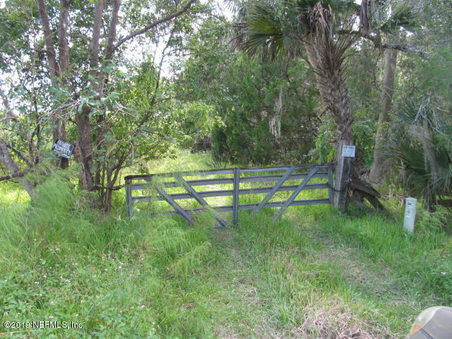 2006 West Cr2006 Road West Bunnell, FL 32110 - Photo 1 of 18 GATE INTO 29 ACRES IMG_0193