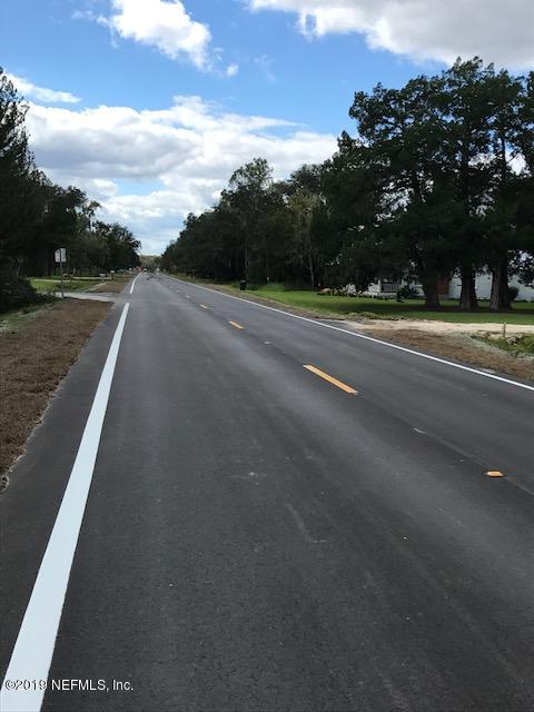 2006 West Cr2006 Road West Bunnell, FL 32110 - Photo 18 of 18 NEW PAVED ROAD TO LAKE! IMG_4351