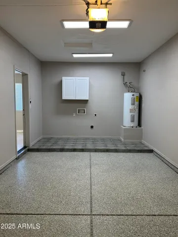 a view of a refrigerator in kitchen and wooden floor