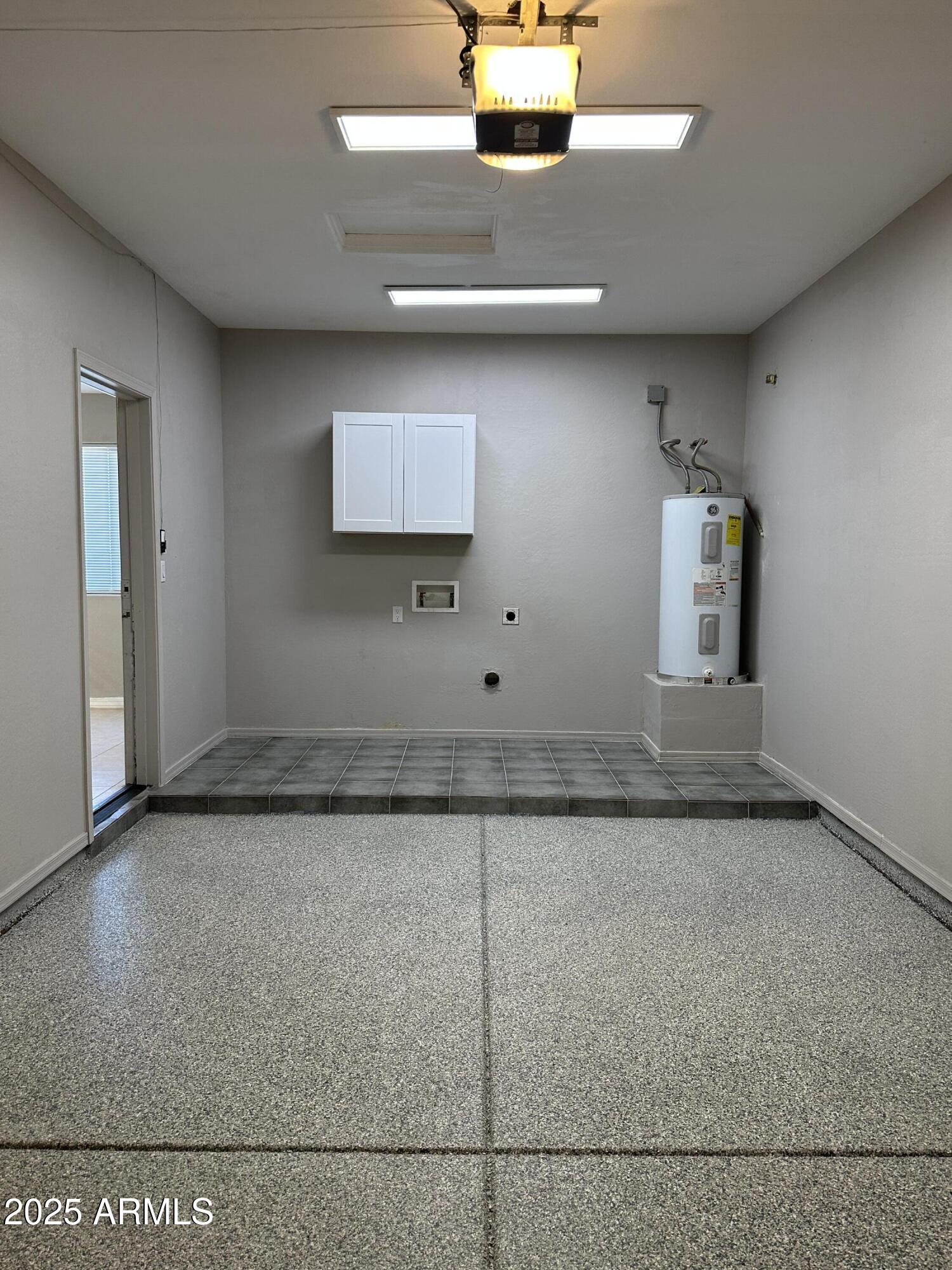 1714 South 5th Street Phoenix, AZ 85004 - Photo 17 of 21 a view of a refrigerator in kitchen and wooden floor