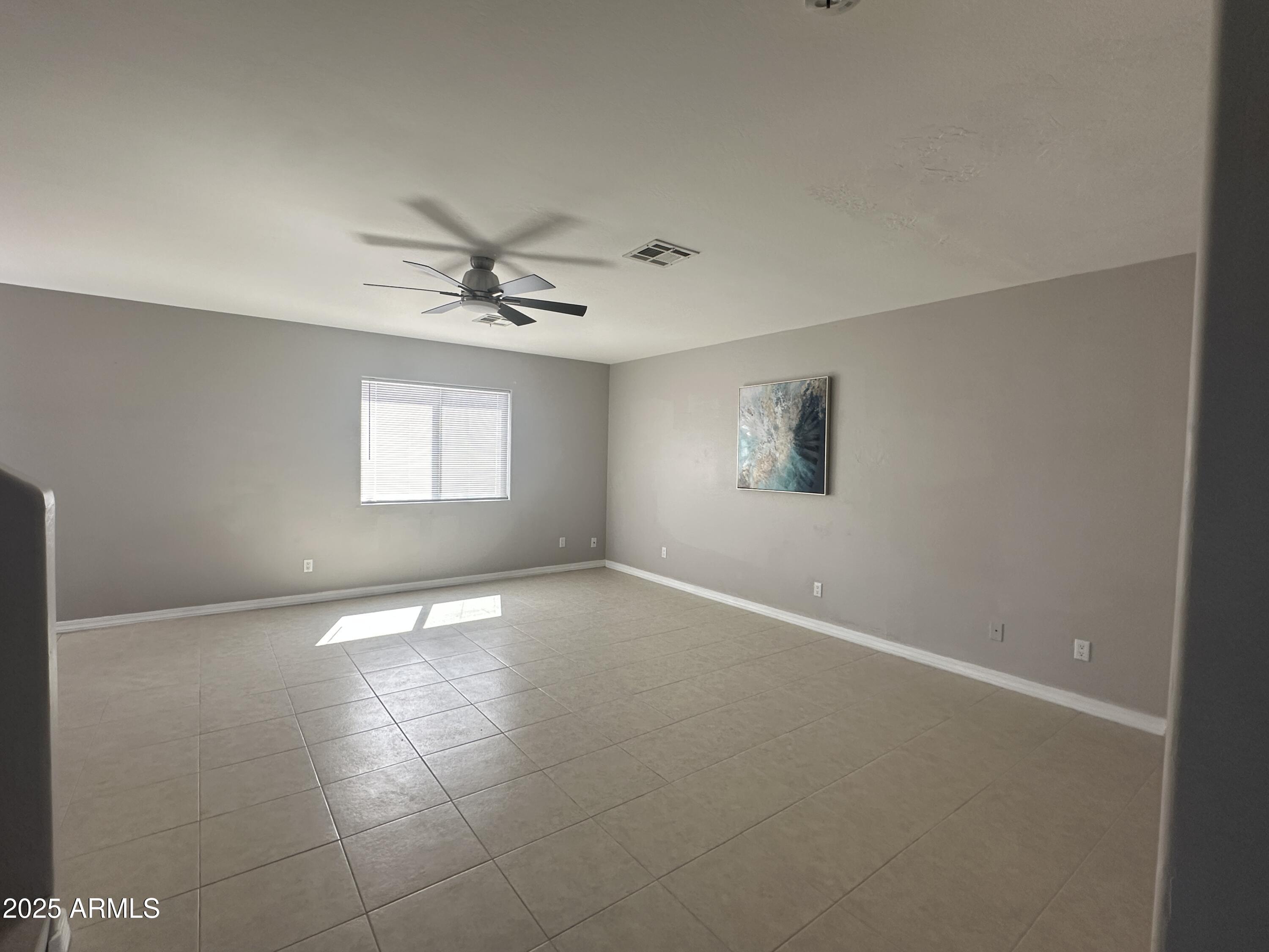 1714 South 5th Street Phoenix, AZ 85004 - Photo 3 of 21 a view of an empty room with a window