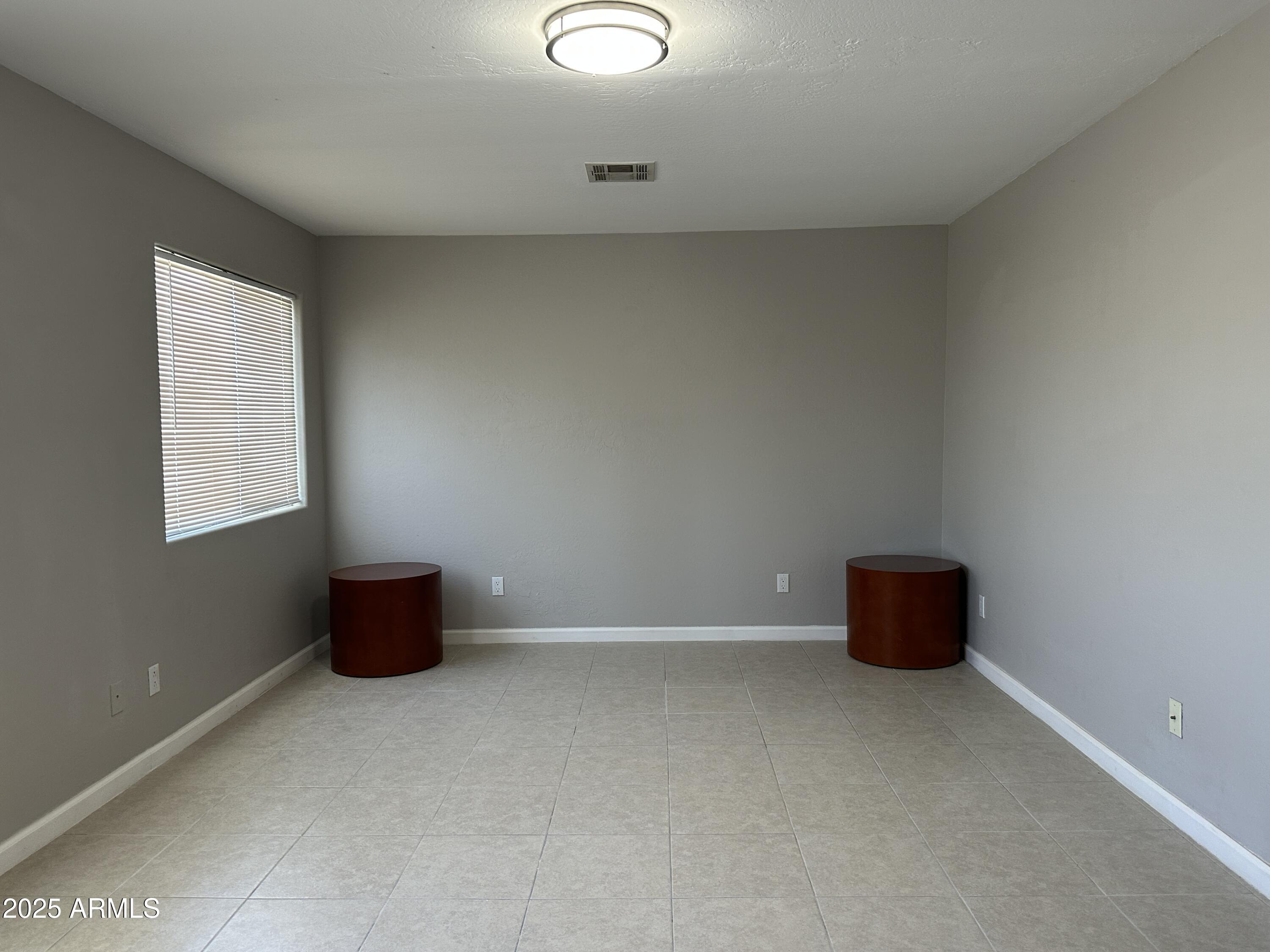1714 South 5th Street Phoenix, AZ 85004 - Photo 7 of 21 a view of an empty room with a window