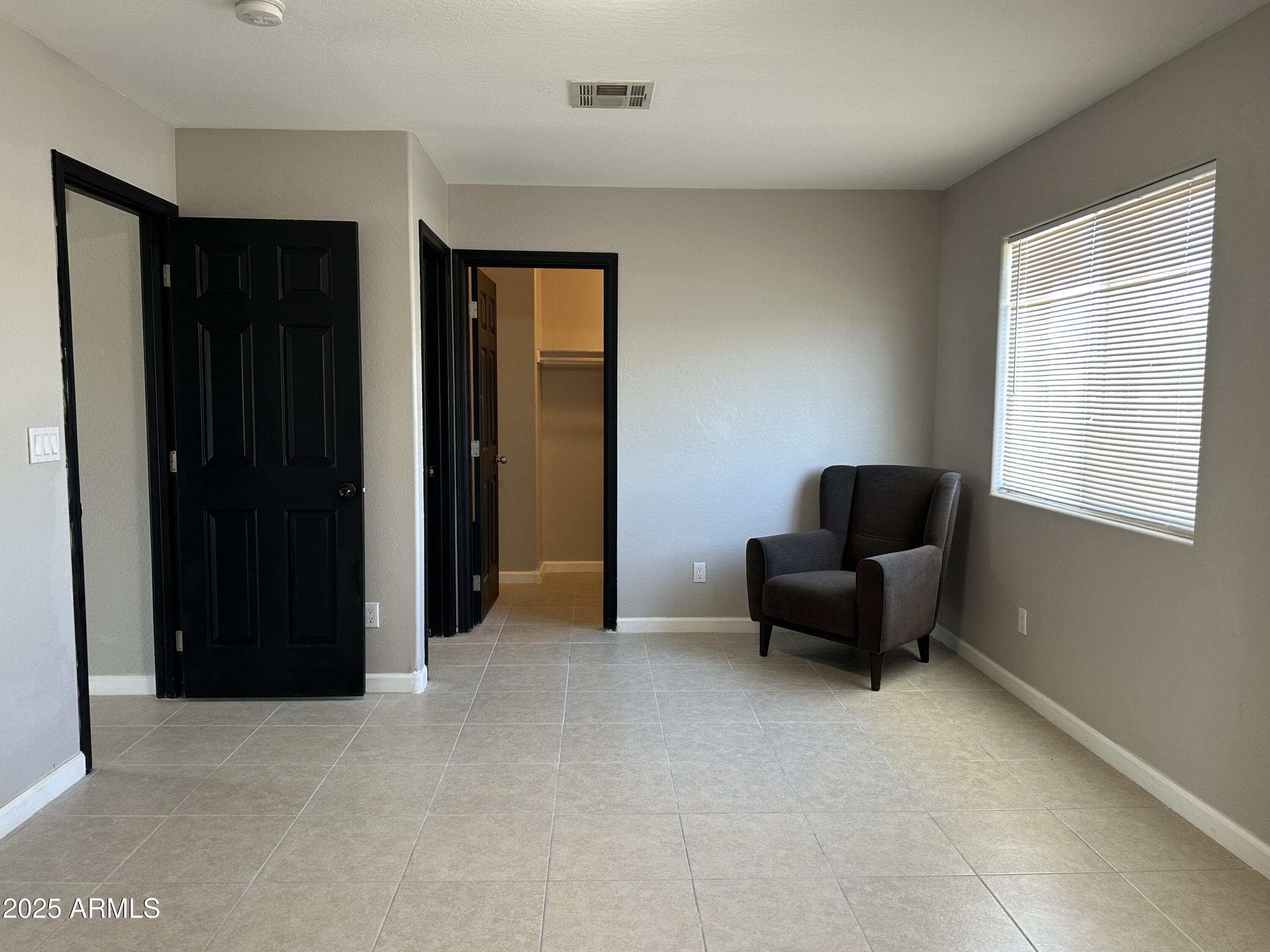 1714 South 5th Street Phoenix, AZ 85004 - Photo 10 of 21 a living room with furniture and a window
