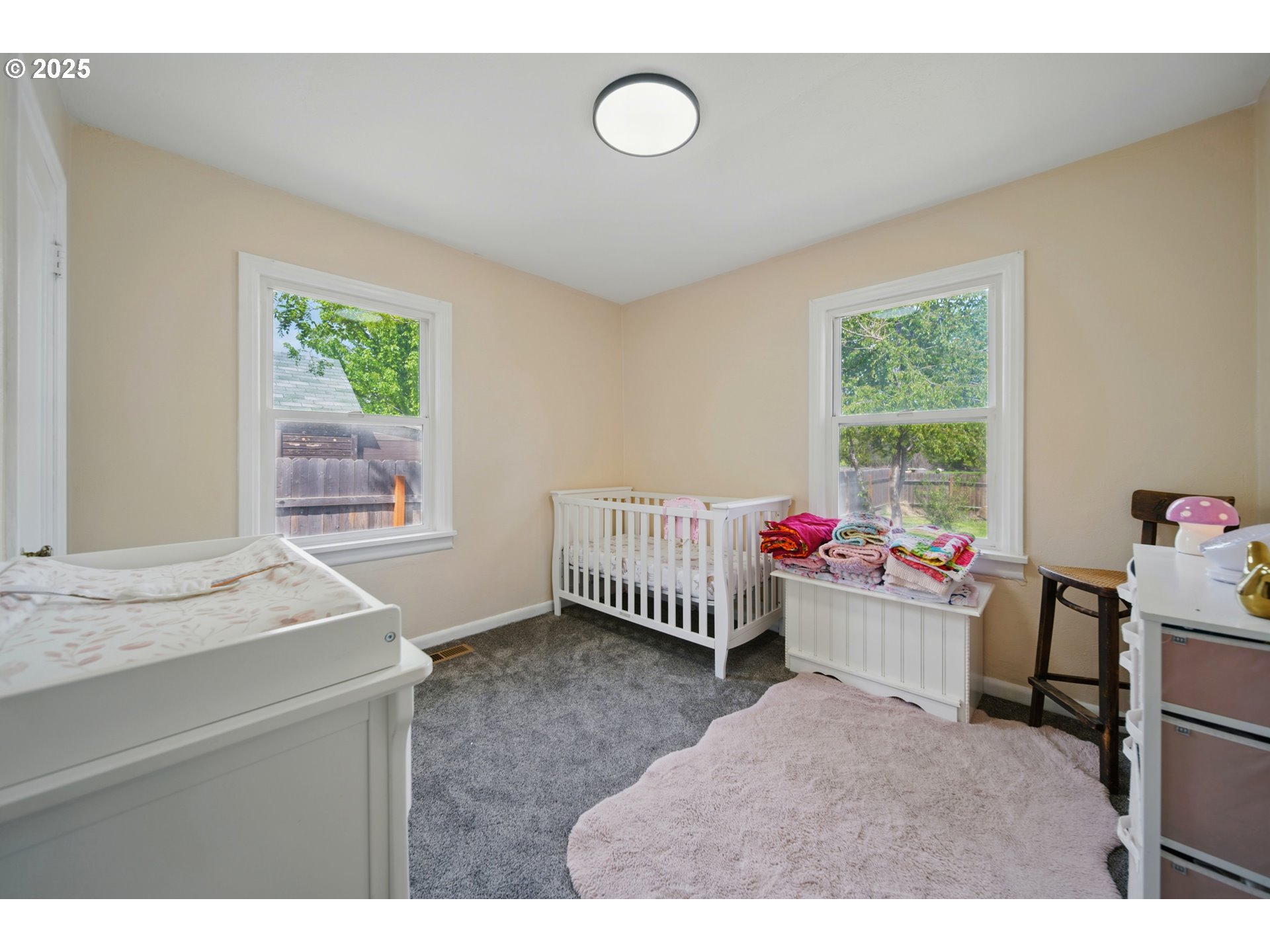 1317 Chestnut Street Milton Freewater, OR 97862 - Photo 13 of 23 a bedroom with a bed and a window