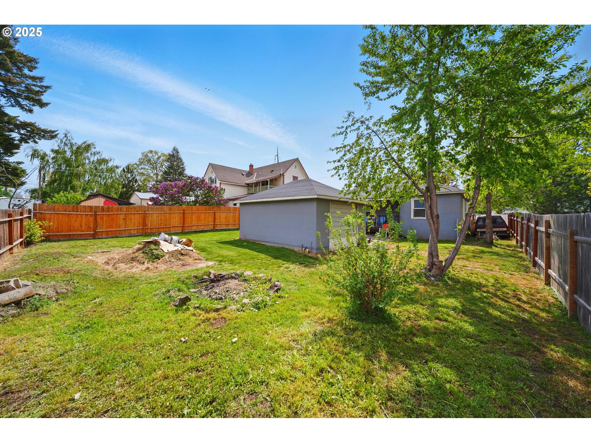 1317 Chestnut Street Milton Freewater, OR 97862 - Photo 18 of 23 a view of a house with a yard