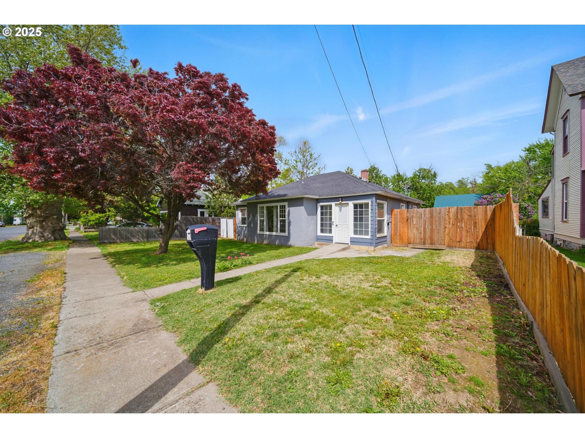 1317 Chestnut Street Milton Freewater, OR 97862 - Photo 22 of 23 a view of a house with a yard