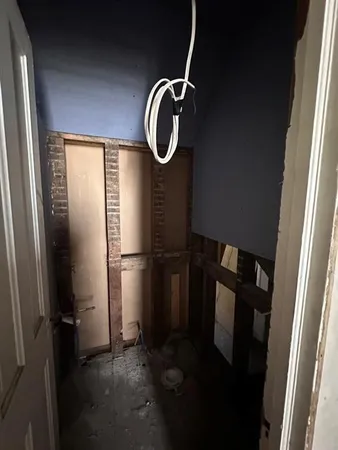 a bathroom with a shower vanity and a mirror