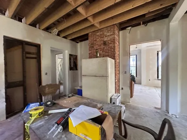 a view of a livingroom with furniture and front door