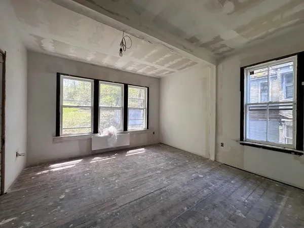 an empty room with windows