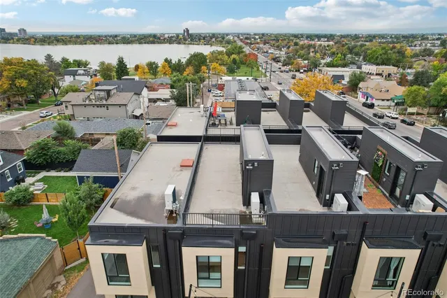 an aerial view of a house with a ocean view