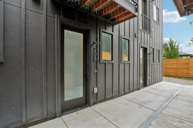 a view of a house with a glass door
