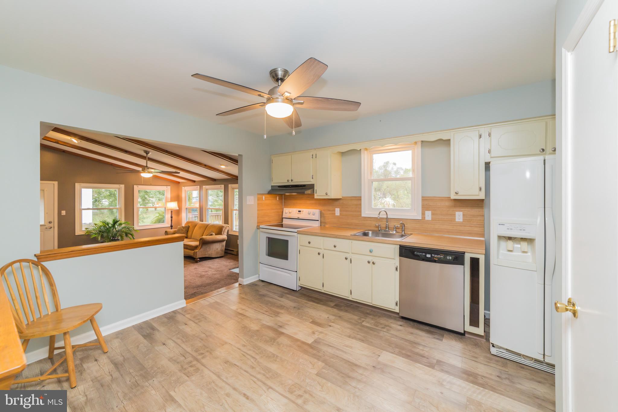 8865 Mountain Road Alburtis, PA 18011 - Photo 19 of 27 Kitchen With Stainless Dishwasher, Ceiling fan