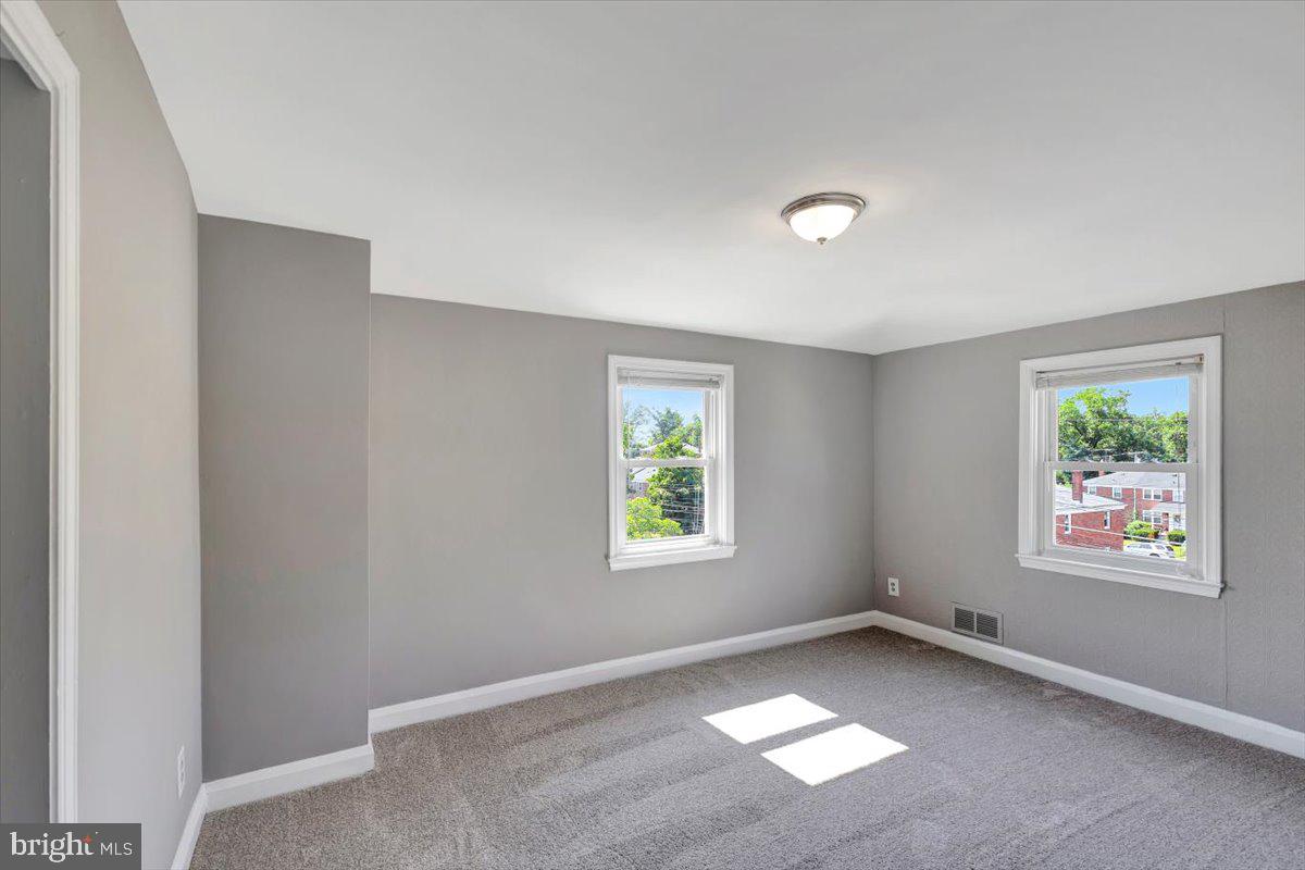 1811 Trenleigh Road Parkville, MD 21234 - Photo 17 of 35 Bedroom 2 - hardwoods under carpet
