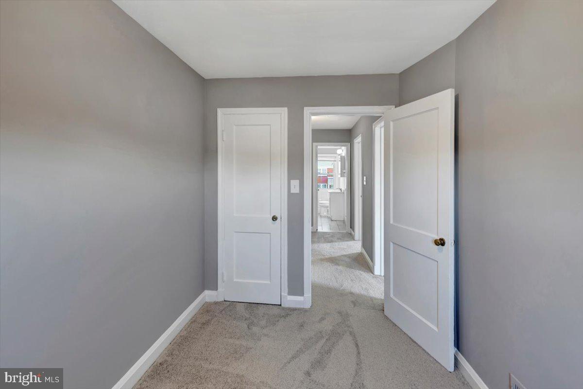 1811 Trenleigh Road Parkville, MD 21234 - Photo 20 of 35 Bedroom 3 - hardwoods under carpet