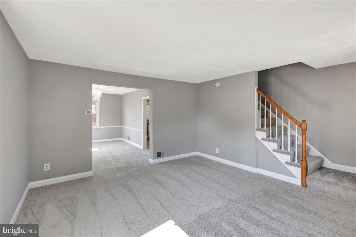 1811 Trenleigh Road Parkville, MD 21234 - Photo 5 of 35 Main level family room-new carpet& freshly painted