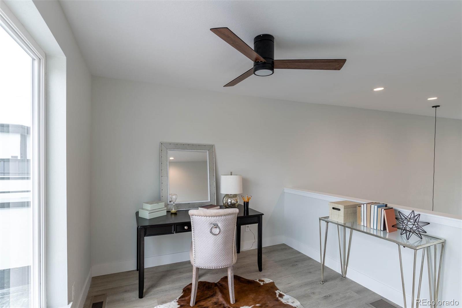 2360 West 49th Avenue Denver, CO 80221 - Photo 17 of 25 a workspace with furniture and window