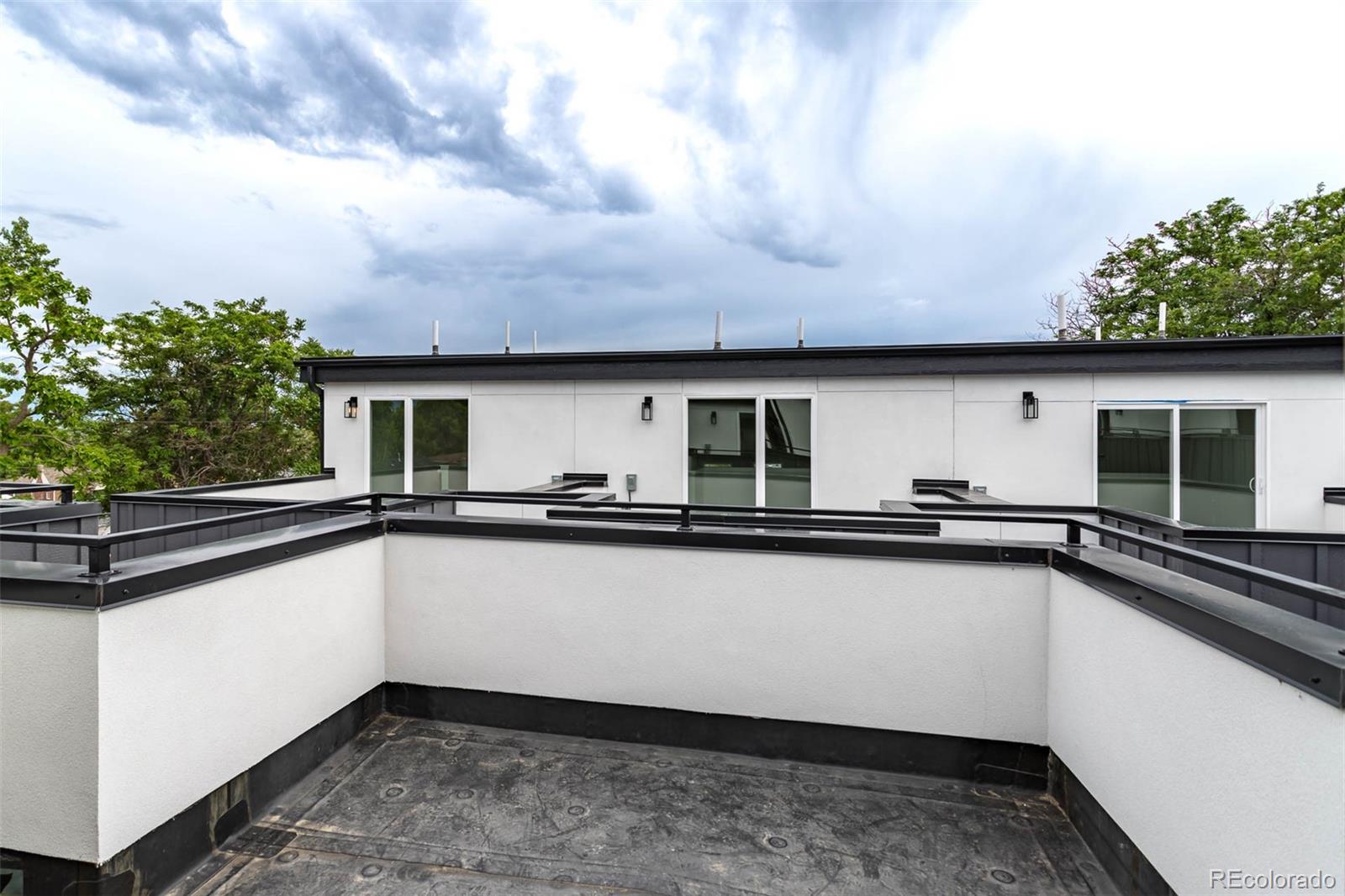 2360 West 49th Avenue Denver, CO 80221 - Photo 18 of 25 a house view with a sink and wooden floor