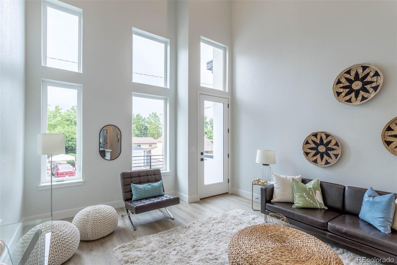 2360 West 49th Avenue Denver, CO 80221 - Photo 6 of 25 a living room with furniture and a window