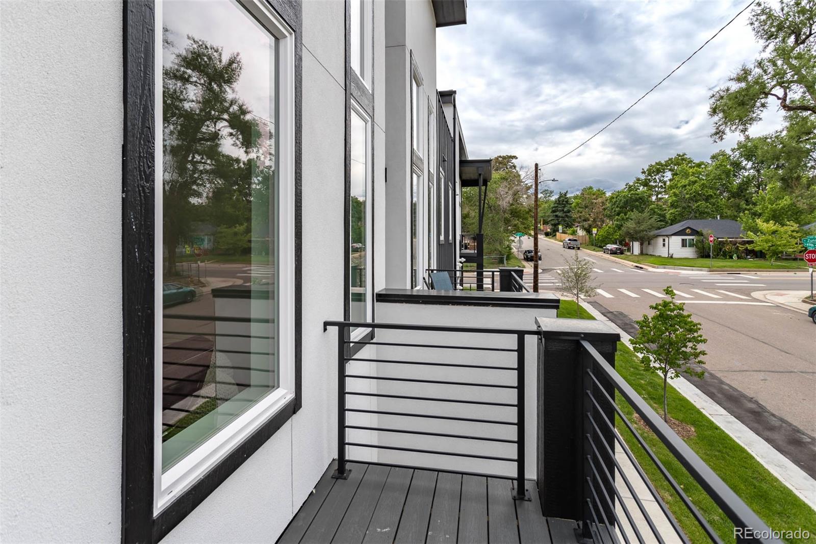 2360 West 49th Avenue Denver, CO 80221 - Photo 8 of 25 a view from deck with patio