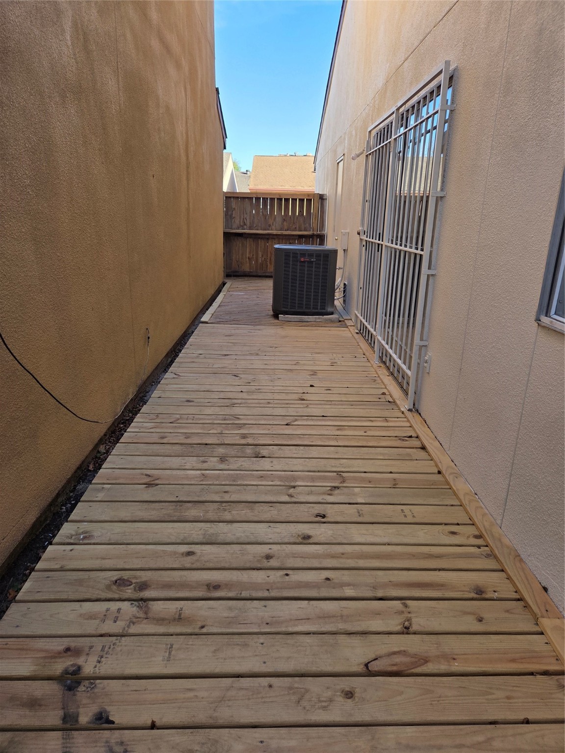 12319 Ridgeside Drive Houston, TX 77072 - Photo 20 of 22 a view of a balcony with wooden floor