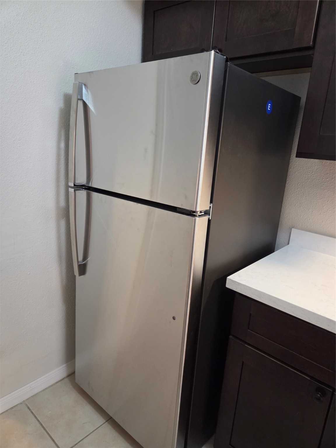 12319 Ridgeside Drive Houston, TX 77072 - Photo 9 of 22 a white refrigerator freezer and sitting area
