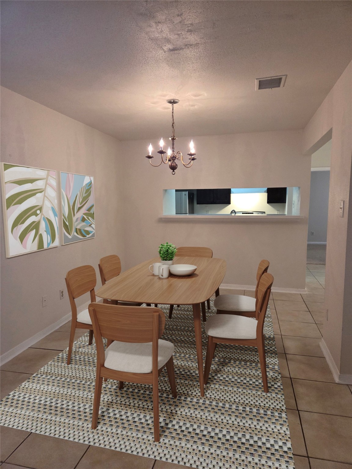 12319 Ridgeside Drive Houston, TX 77072 - Photo 10 of 22 a dining room with furniture and chandelier